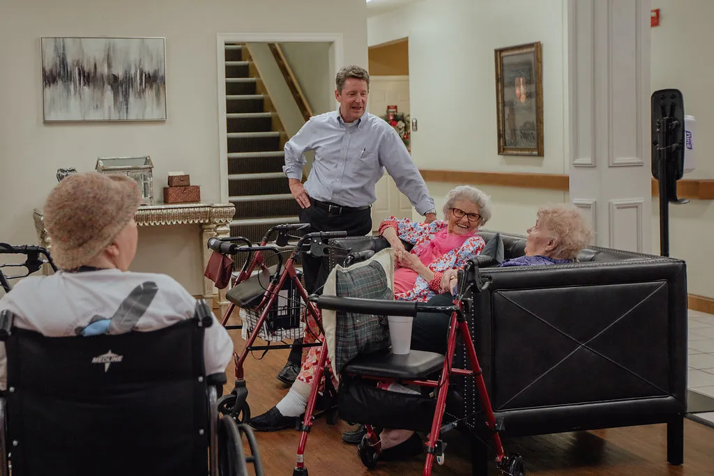 Resident enjoying a comfortable residential setting at Heritage Assisted Living
