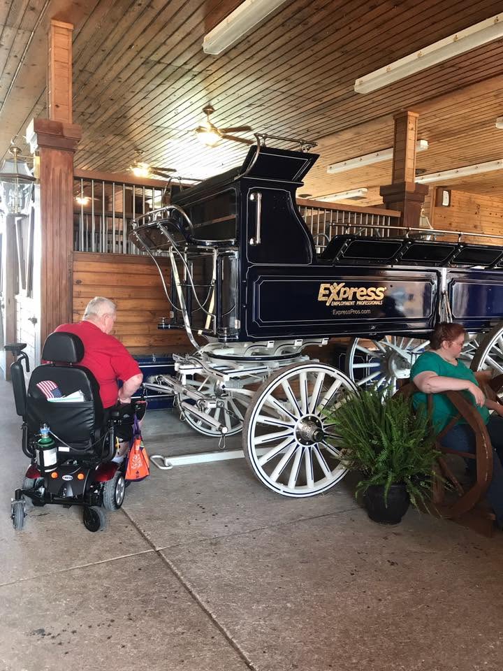 Heritage residents enjoying an organized community outing away from the building