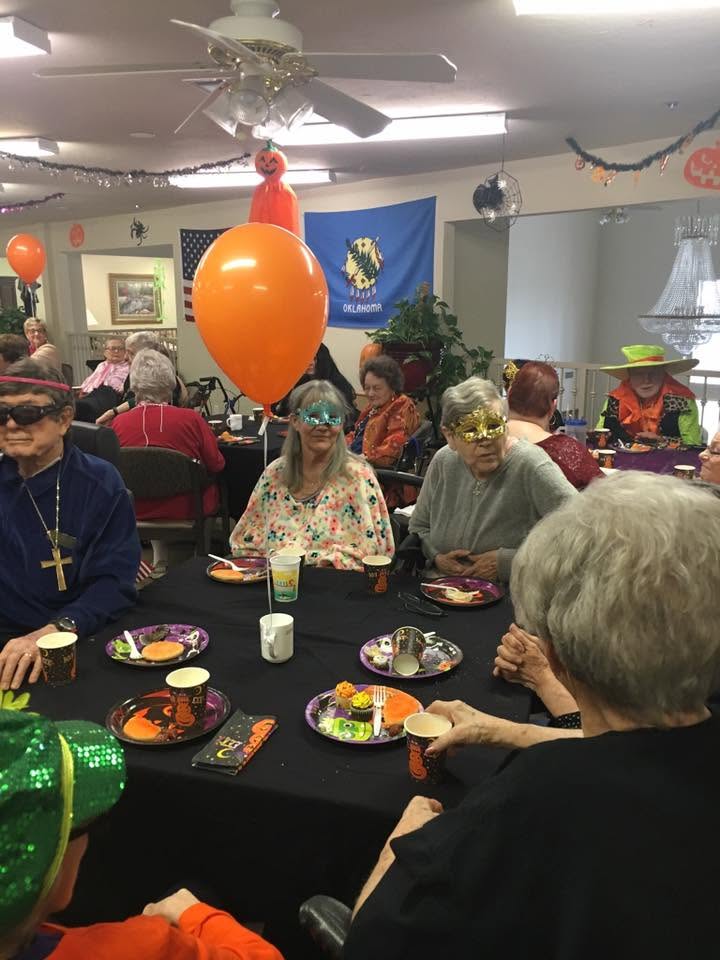 Heritage residents, families, and staff gathered together for a holiday celebration