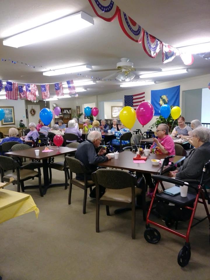 Heritage residents celebrating monthly birthdays together